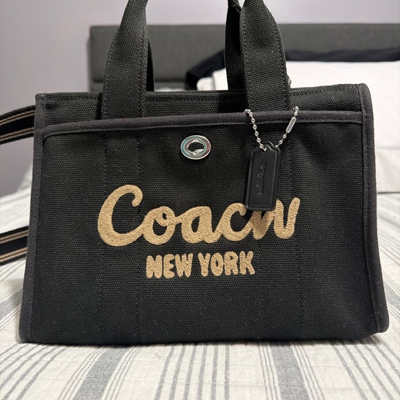 Coach Handbags - Coach Black and Tan Canvas Tote